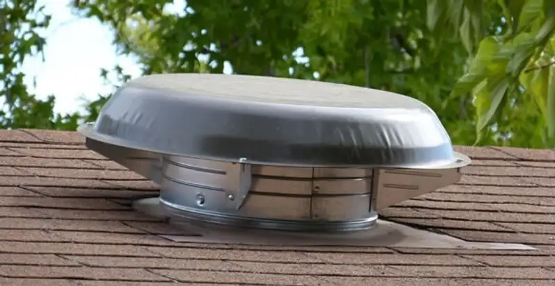 attic fan installation services with low-profile roof ventilation unit in Littleton, CO