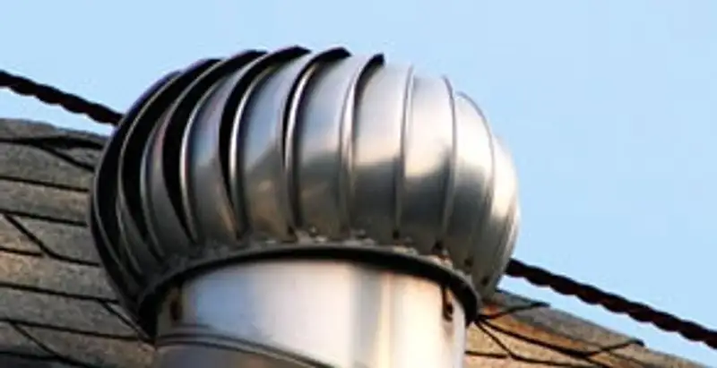 attic fan installation services with professionally installed roof ventilation unit in Littleton, CO