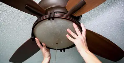 Ceiling fan repair and reinstallation on ceiling mount in Littleton, CO