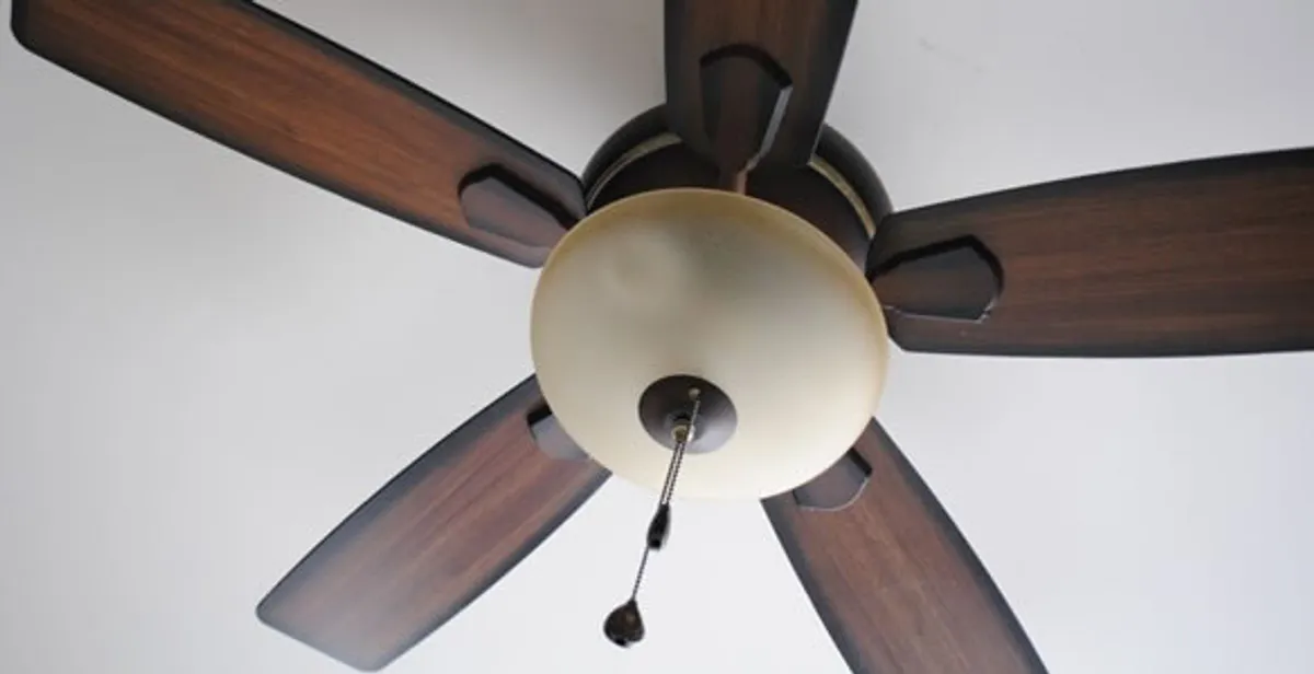 Fully installed ceiling fan with balanced blades and light fixture in Littleton, CO