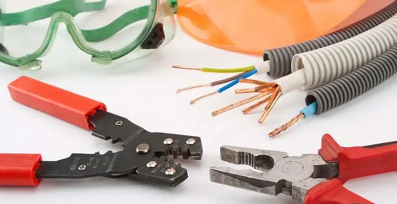 Electrical wiring repair with professional tools and safety equipment in Morrison, CO