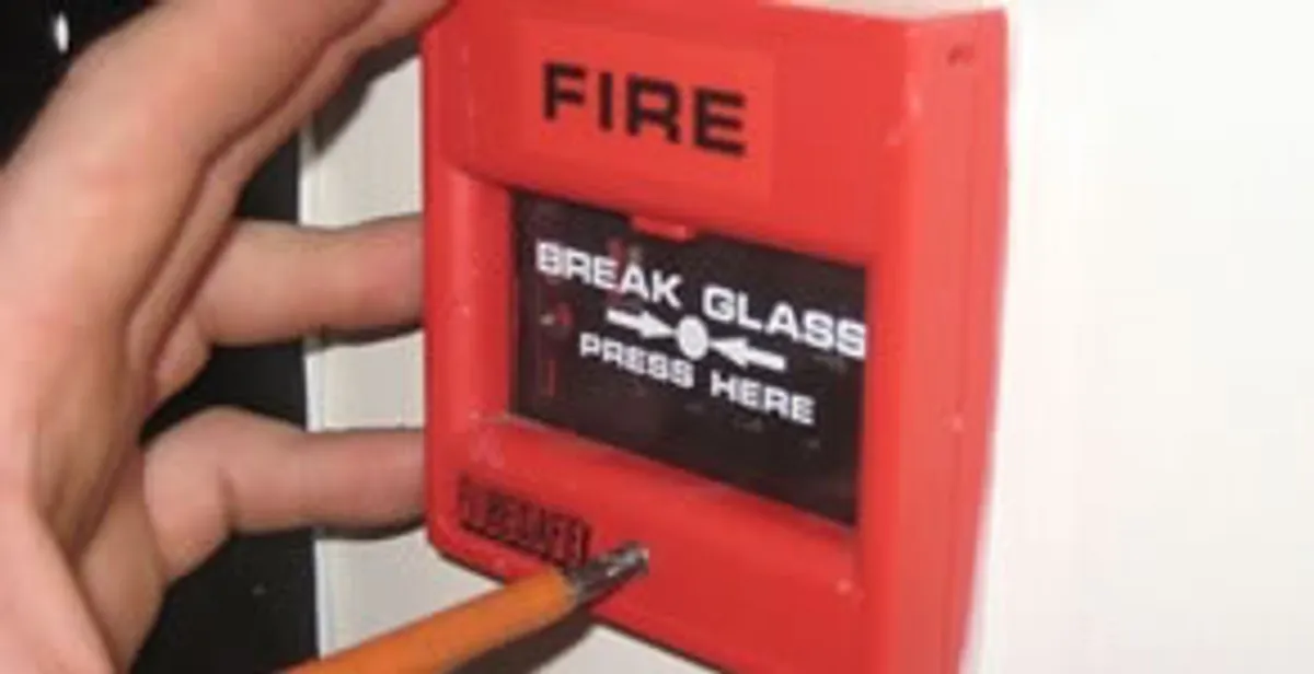 fire alarm installation service showing manual fire alarm pull station installed by licensed electricians in Littleton, CO