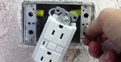 gfci circuits service showing installation of a ground fault circuit interrupter outlet by licensed electricians in Littleton, CO