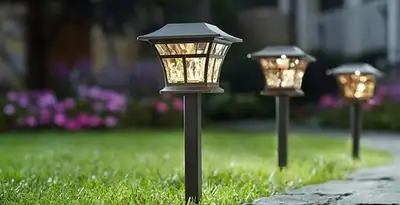landscape lighting installation services with professionally installed pathway lights in Littleton, CO
