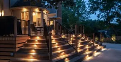 Residential electrician installing outdoor lighting for home safety in Littleton, CO